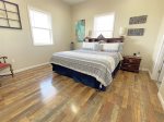 Master bedroom with king sized bed 